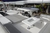 Luxurious 2021 Leopard 50 catamaran deck with seating and helm station.