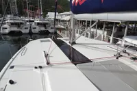 2021 Leopard 50 catamaran docked at marina, showcasing deck and rigging.