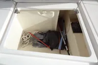 Open storage compartment on Leopard 50 yacht, containing ropes and tools, 2021 model.
