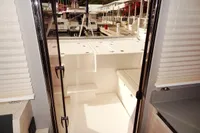Interior view of a 2021 Leopard 50 yacht, showcasing sleek design and marina backdrop.