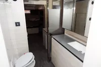 Modern bathroom interior in 2021 Leopard 50 yacht, featuring sleek design and spacious layout.