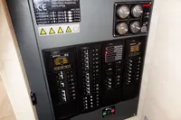 Electrical control panel of a 2021 Leopard 50, featuring gauges and circuit breakers.