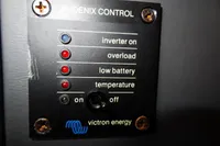 Phoenix Control panel with status indicators for inverter, overload, battery, and temperature by Victron Energy.