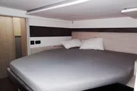 Interior of 2021 Leopard 50 yacht featuring a cozy bedroom with modern design.