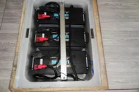 Battery compartment of a 2021 Leopard 50 yacht, featuring multiple black batteries.