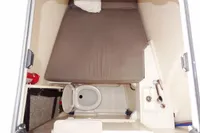 Interior cabin of 2021 Leopard 50 boat with bed and toilet.