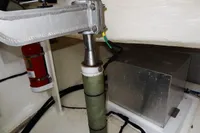 Engine compartment of 2021 Leopard 50 yacht with fire extinguisher and metal components.