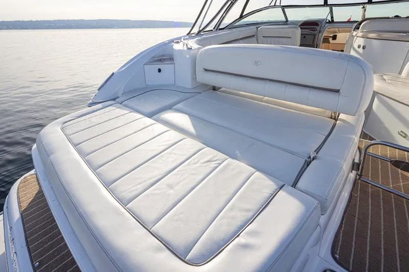 Sophia Grace Yacht Photos Pics Luxury seating on a 2006 Cobalt 323 boat, overlooking calm waters.