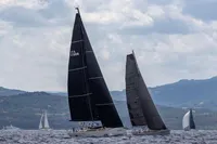 Sailboats racing on the sea, featuring a 2016 Solaris 58 model.