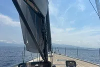 Sailing yacht Solaris 58, 2016 model, with sleek deck and sails, cruising on open sea.