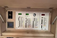 Electrical control panel on a 2016 Solaris 58 yacht, featuring digital displays and switches.