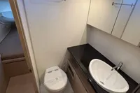 Modern bathroom in a 2016 Solaris 58 yacht with sink, toilet, and mirror.