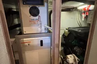 Engine room of a 2016 Solaris 58 yacht with Kohler generator and chiller inverter.