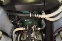 Engine compartment of a 2016 Solaris 58 yacht, showcasing intricate mechanical components.