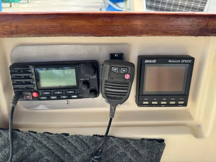 Otter II Yacht Photos Pics Control panel of a 1999 Island Packet 45 sailboat with radio and speed display.