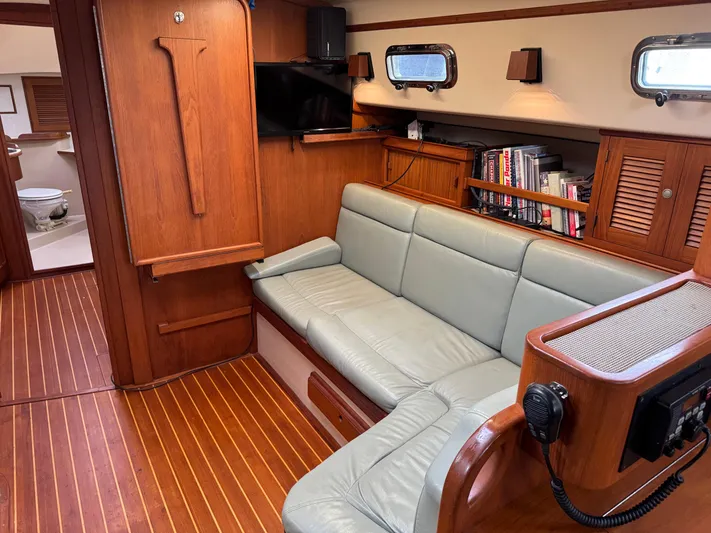 Otter II Yacht Photos Pics Interior of 1999 Island Packet 45 yacht with leather seating and wooden finishes.