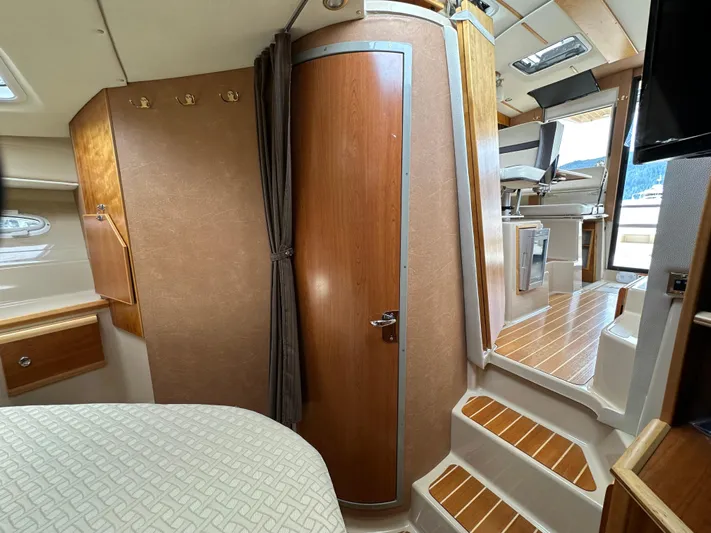  Yacht Photos Pics Interior of 2016 Cutwater CB boat, featuring wood accents and modern design elements.