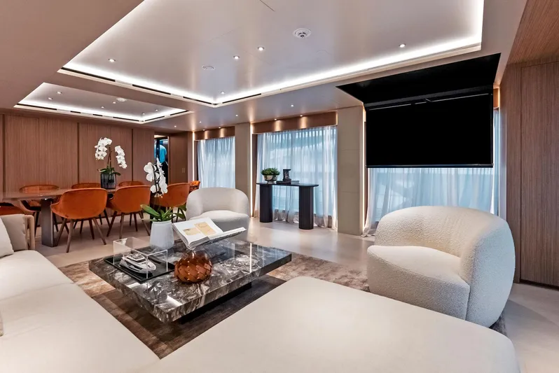 Ciao M Yacht Photos Pics Luxurious 2023 Custom Line 106' yacht interior with modern decor and elegant furnishings.