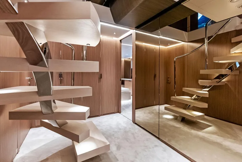 Ciao M Yacht Photos Pics Luxurious modern staircase in 2023 Custom Line 106' yacht interior.