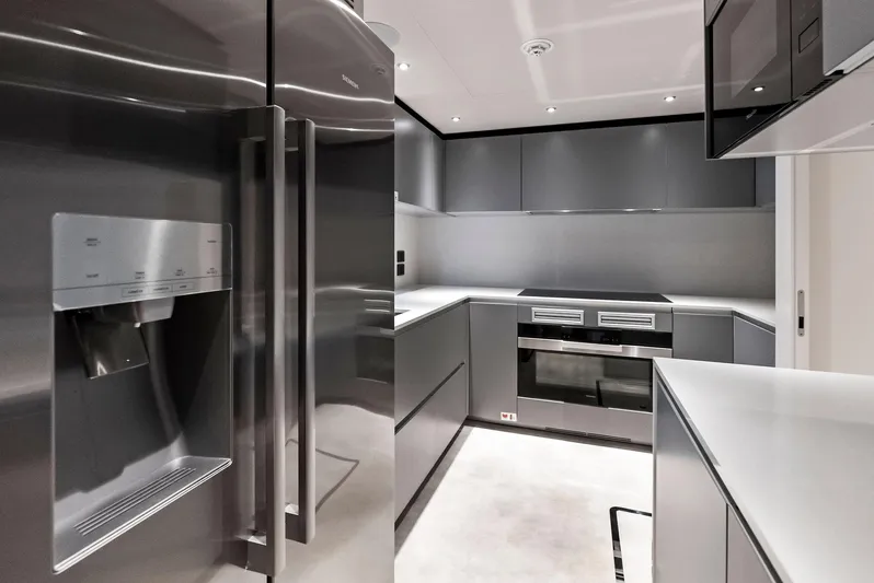 Ciao M Yacht Photos Pics Modern kitchen in 2023 Custom Line 106' yacht with sleek appliances and minimalist design.