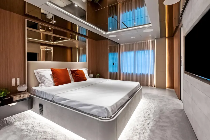 Ciao M Yacht Photos Pics Luxurious bedroom interior on 2023 Custom Line 106' yacht with modern design and ambient lighting.