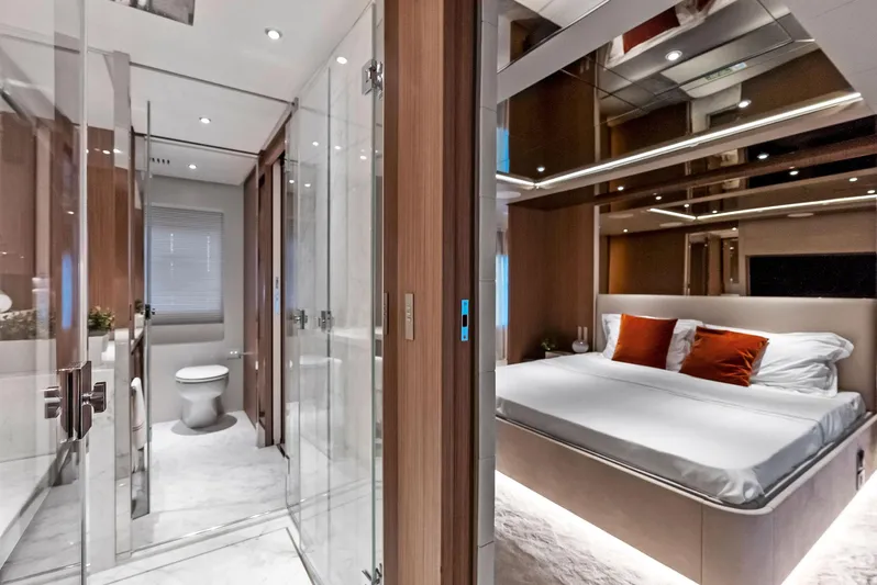 Ciao M Yacht Photos Pics Luxurious 2023 Custom Line 106' yacht bedroom and bathroom interior.
