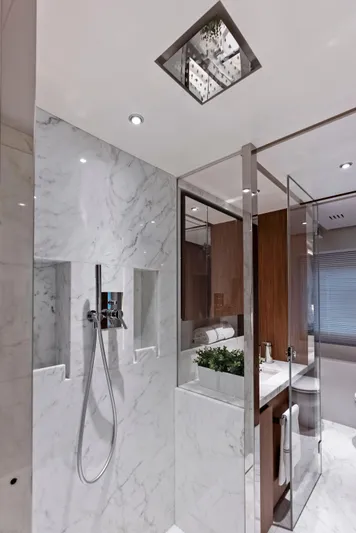 Ciao M Yacht Photos Pics Luxurious yacht bathroom with marble shower, modern fixtures, and elegant design, 2023 Custom Line 106'.