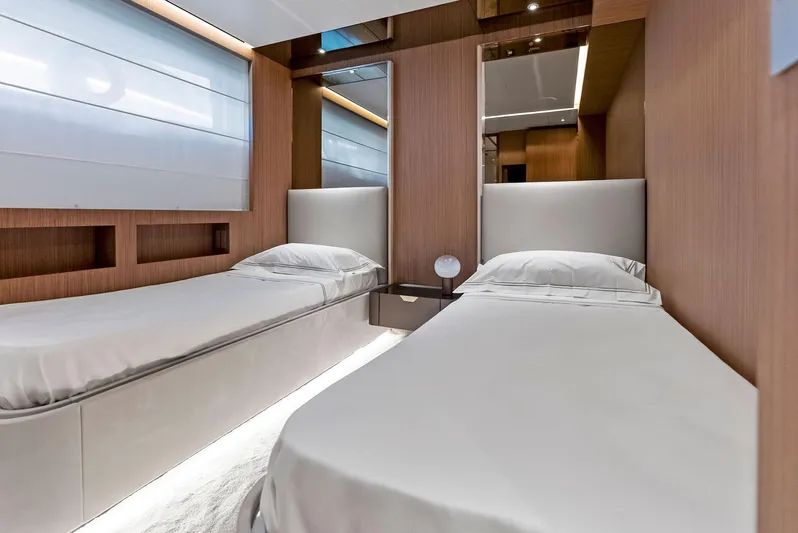 Ciao M Yacht Photos Pics Luxurious twin bedroom in 2023 Custom Line 106' yacht, featuring modern design and elegant finishes.
