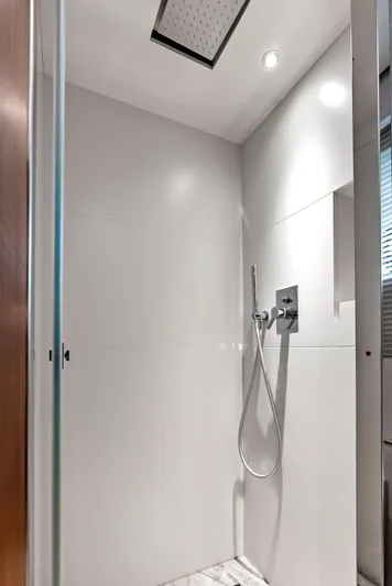 Ciao M Yacht Photos Pics Luxurious modern shower in 2023 Custom Line 106' yacht bathroom.