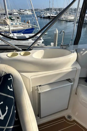 Invictus II Yacht Photos Pics Interior of 2006 Meridian 368 yacht with sink and marina view.