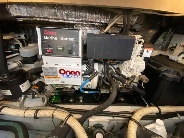 Invictus II Yacht Photos Pics Onan marine generator in a 2006 Meridian 368 engine room.