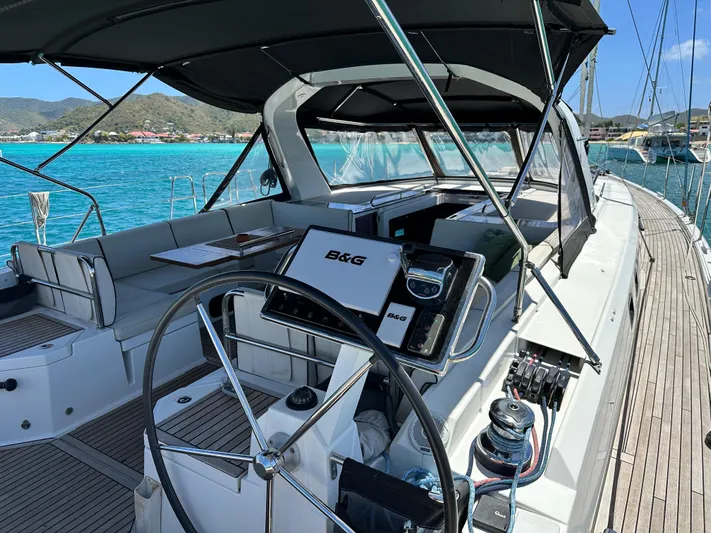 Yacht Photos Pics 2019 Beneteau Oceanis Yacht 62 with sleek deck, modern helm, and stunning ocean backdrop.