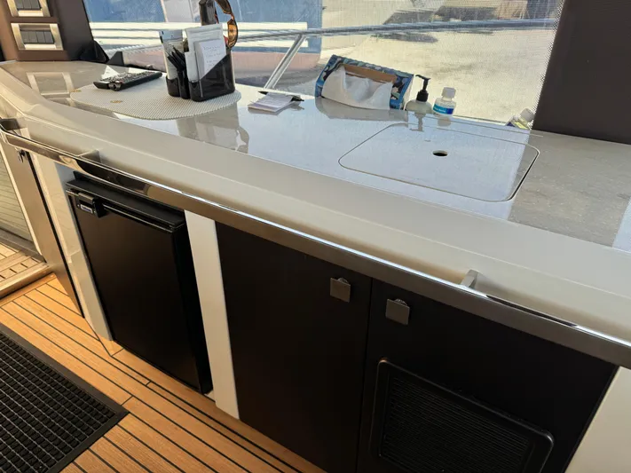  Yacht Photos Pics Modern kitchen area on 2021 Galeon 425 HTS yacht with sleek countertops and appliances.