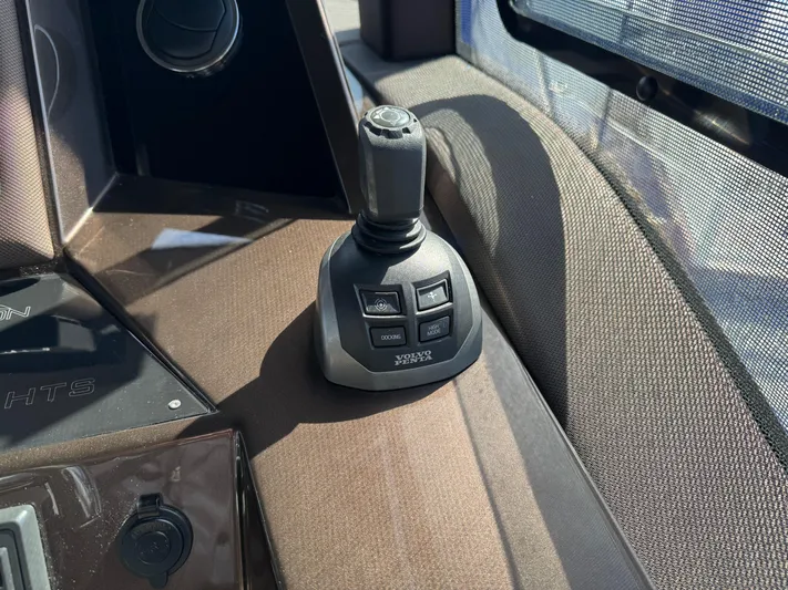  Yacht Photos Pics Joystick control on 2021 Galeon 425 HTS yacht dashboard, featuring Volvo Penta system.
