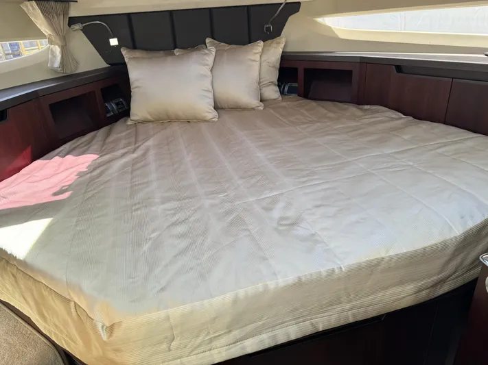  Yacht Photos Pics Luxurious cabin interior of 2021 Galeon 425 HTS yacht with spacious bed and elegant decor.