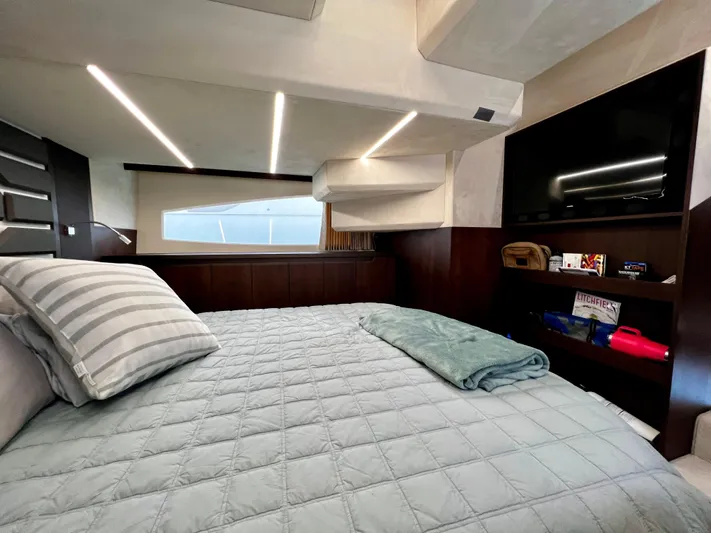  Yacht Photos Pics Luxurious bedroom interior of 2021 Galeon 425 HTS yacht with modern design and amenities.