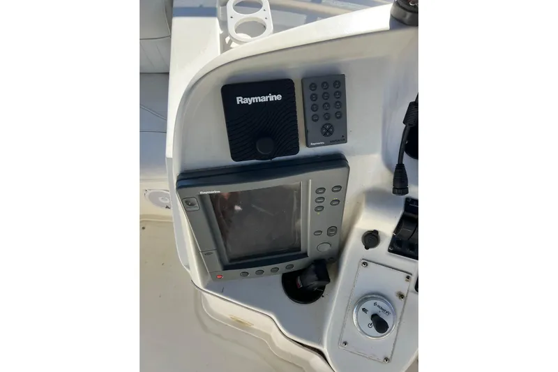 Quick X Yacht Photos Pics Control panel of 2004 Cruisers Yachts 3750 Motoryacht with Raymarine navigation equipment.
