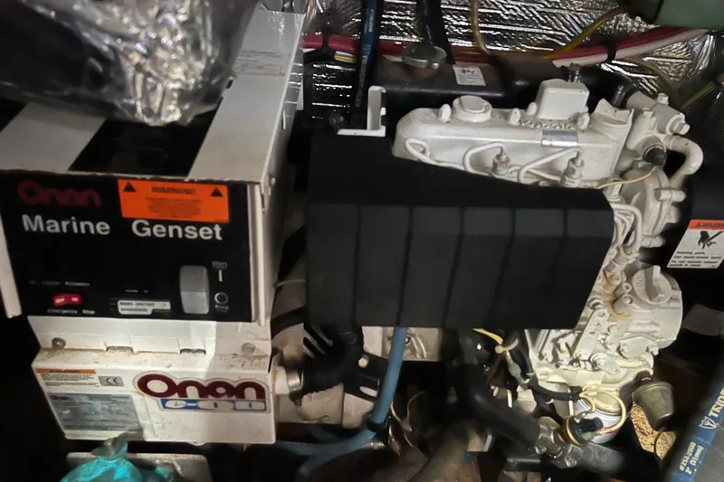 Quick X Yacht Photos Pics Onan marine generator in 2004 Cruisers Yachts 3750 Motoryacht engine room.