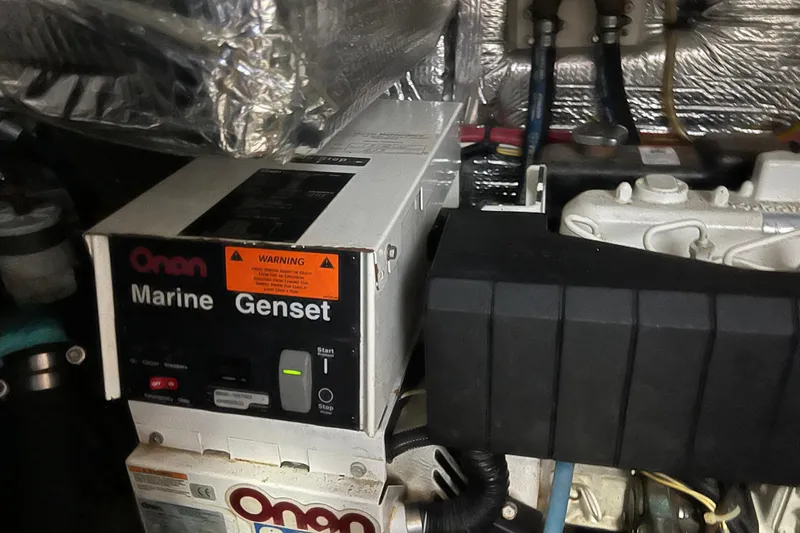 Quick X Yacht Photos Pics Onan Marine Genset in 2004 Cruisers Yachts 3750 Motoryacht engine room.