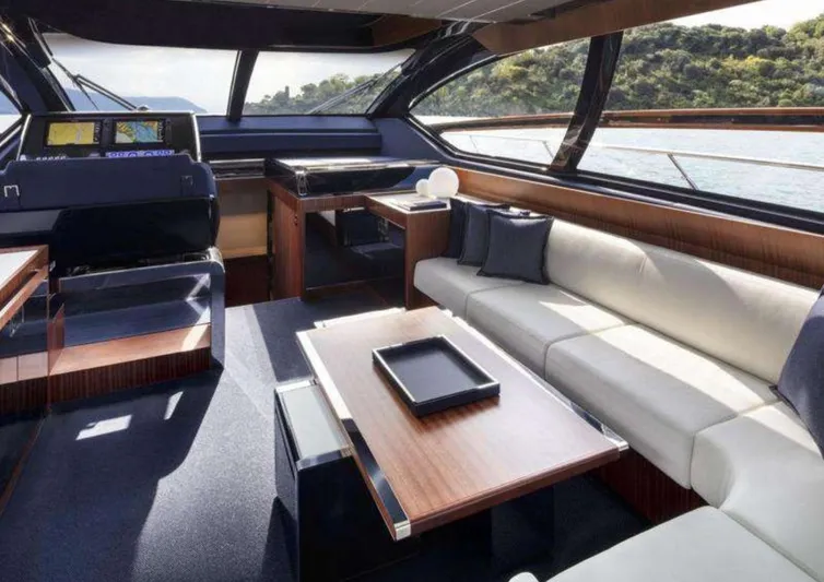  Yacht Photos Pics Luxurious interior of 2021 Riva 66' Ribelle yacht with elegant seating and modern design.