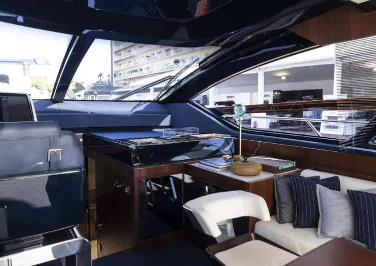 Yacht Photos Pics Luxurious interior of 2021 Riva 66' Ribelle yacht with modern seating and elegant design.