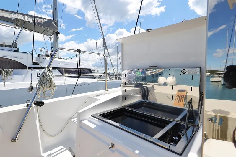 Breeze Yacht Photos Pics Outdoor kitchen on 2025 Bali 4.4 yacht, featuring sleek design and marina view.