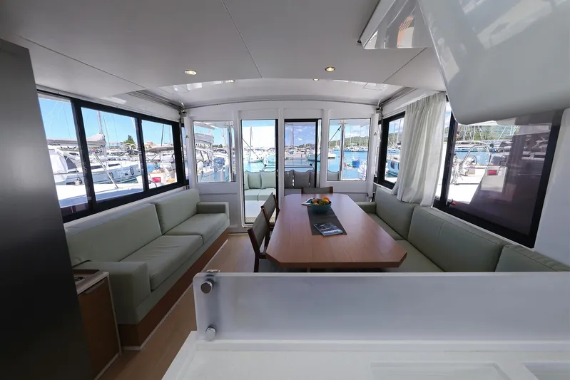 Breeze Yacht Photos Pics Luxurious interior of 2025 Bali 4.4 yacht with spacious seating and marina view.