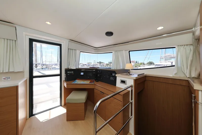 Breeze Yacht Photos Pics Interior of 2025 Bali 4.4 yacht with navigation station and panoramic windows.