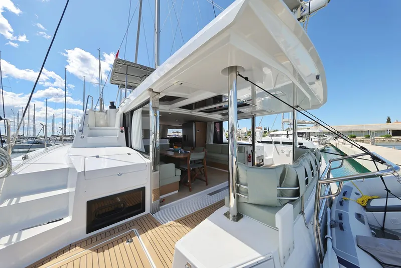 Breeze Yacht Photos Pics Luxurious 2025 Bali 4.4 yacht with spacious deck and modern interior at marina.