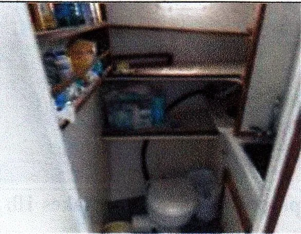 Janet Lynn Yacht Photos Pics Small bathroom with shelves in a 1999 Custom 30 Novi Hardtop Cruiser.