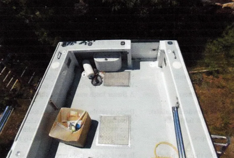 Janet Lynn Yacht Photos Pics 1999 Custom 30 Novi Hardtop Cruiser deck with storage and equipment.