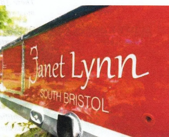 Janet Lynn Yacht Photos Pics Red boat stern with "Janet Lynn" and "South Bristol" text, Custom 30 Novi Hardtop Cruiser, 1999.