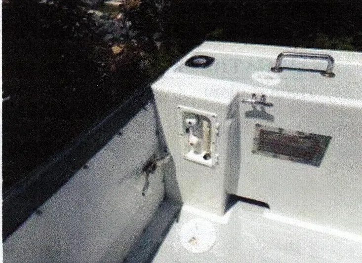 Janet Lynn Yacht Photos Pics 1999 Custom 30 Novi Hardtop Cruiser interior detail with control panel and handle.