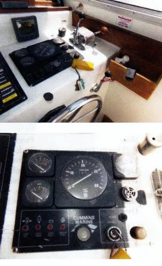 Janet Lynn Yacht Photos Pics 1999 Custom 30 Novi Hardtop Cruiser dashboard with Cummins Marine controls and gauges.
